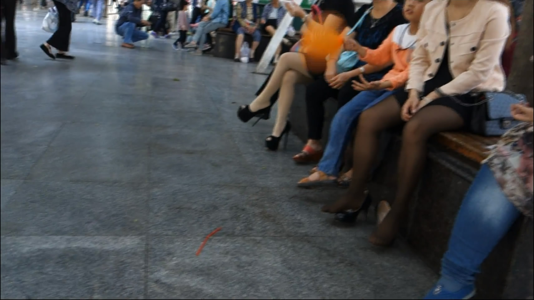 Group of Woman Sat Chatting Then Play Their Shoes